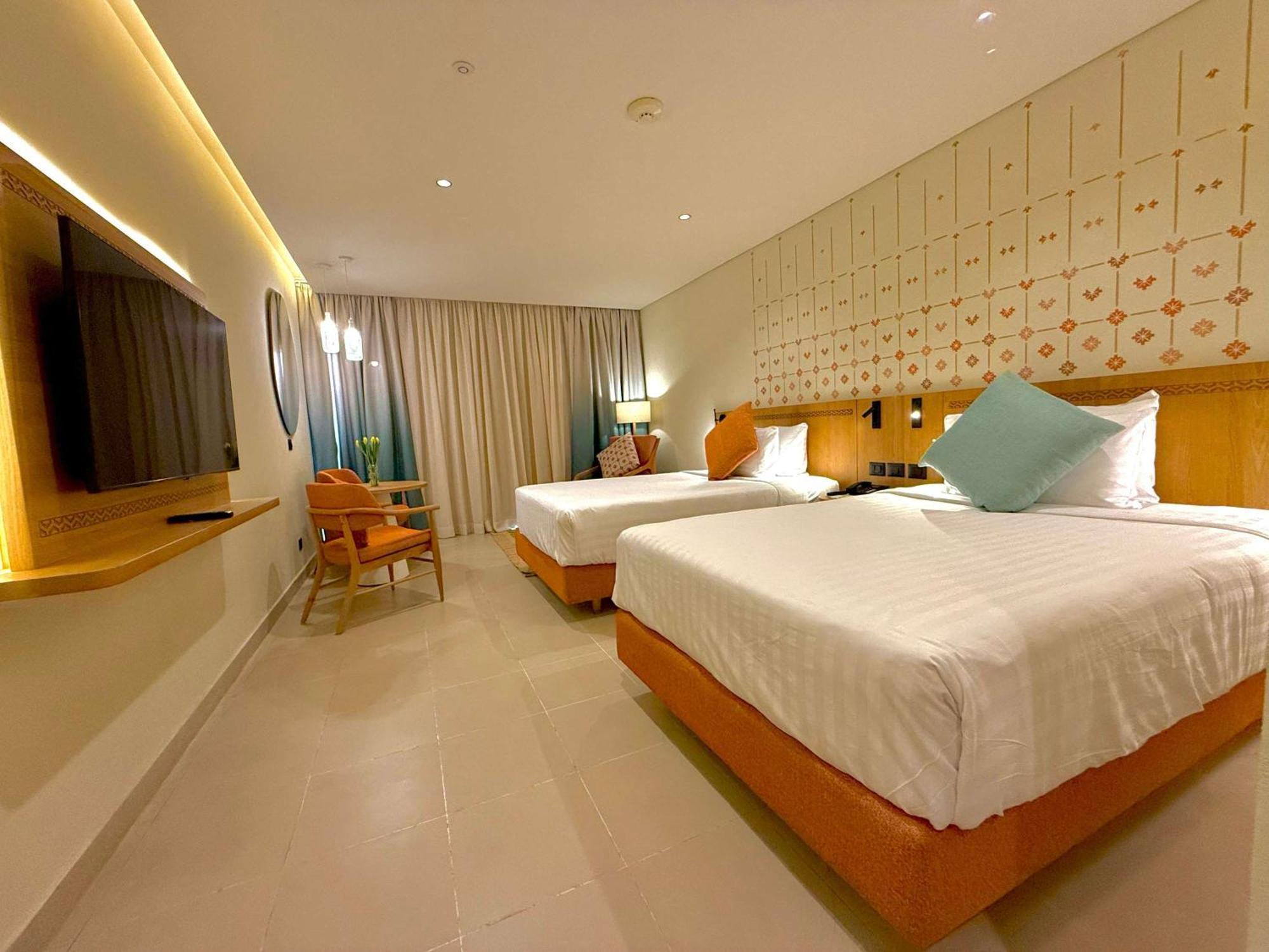 Naama Bay Promenade Beach Resort Managed By Accor Sharm el Sheikh Esterno foto Deluxe Room